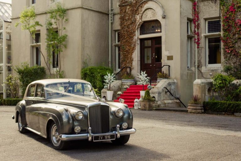 Cahernane House Hotel wedding venue with vintage wedding car